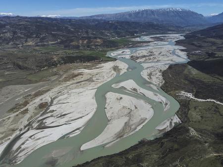 Vjosa © Nick St.Oegger The wild Vjosa River flows in a broad gravel bed through a wide valley.